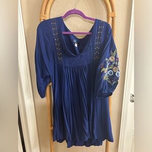 Blue mini dress with embroidered stitchwork design on sleeves